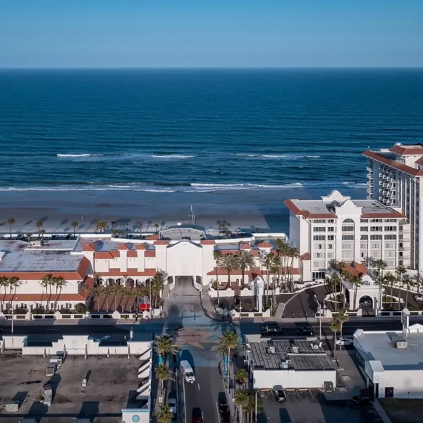 property aerial view with beach in background at beautiful oceanfront Plaza Resort & Spa in Daytona Beach Florida