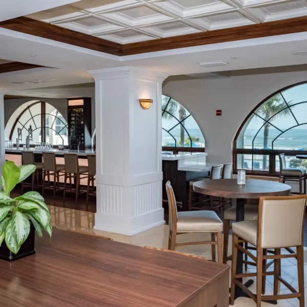 indoor restuarant and bar overlooking the beach at beautiful oceanfront Plaza Resort & Spa in Daytona Beach Florida