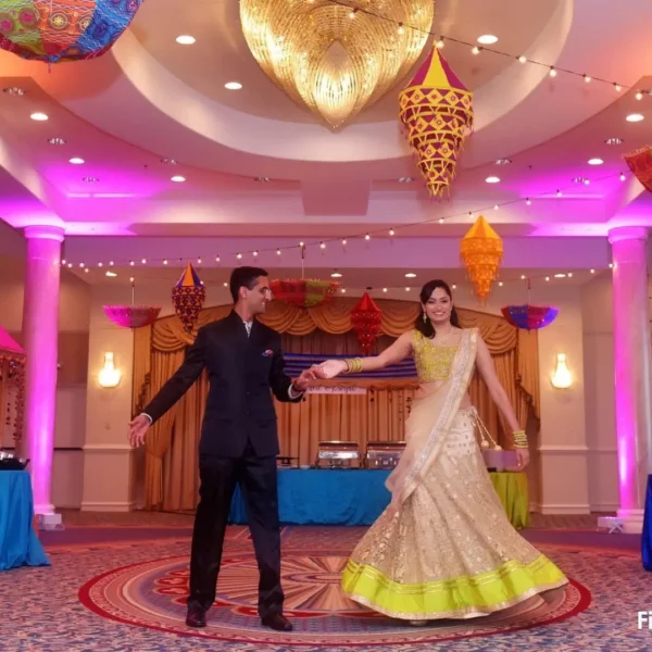 bride and groom in traditional Indian wedding attire dancing in the ballroom at beautiful oceanfront Plaza Resort & Spa in Daytona Beach Florida