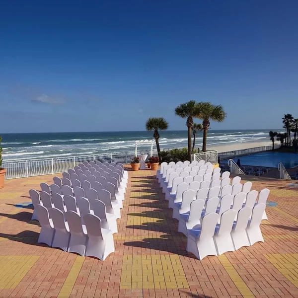 ceremony seating with an altar on the patio overlooking the ocean at beautiful oceanfront Plaza Resort & Spa in Daytona Beach Florida